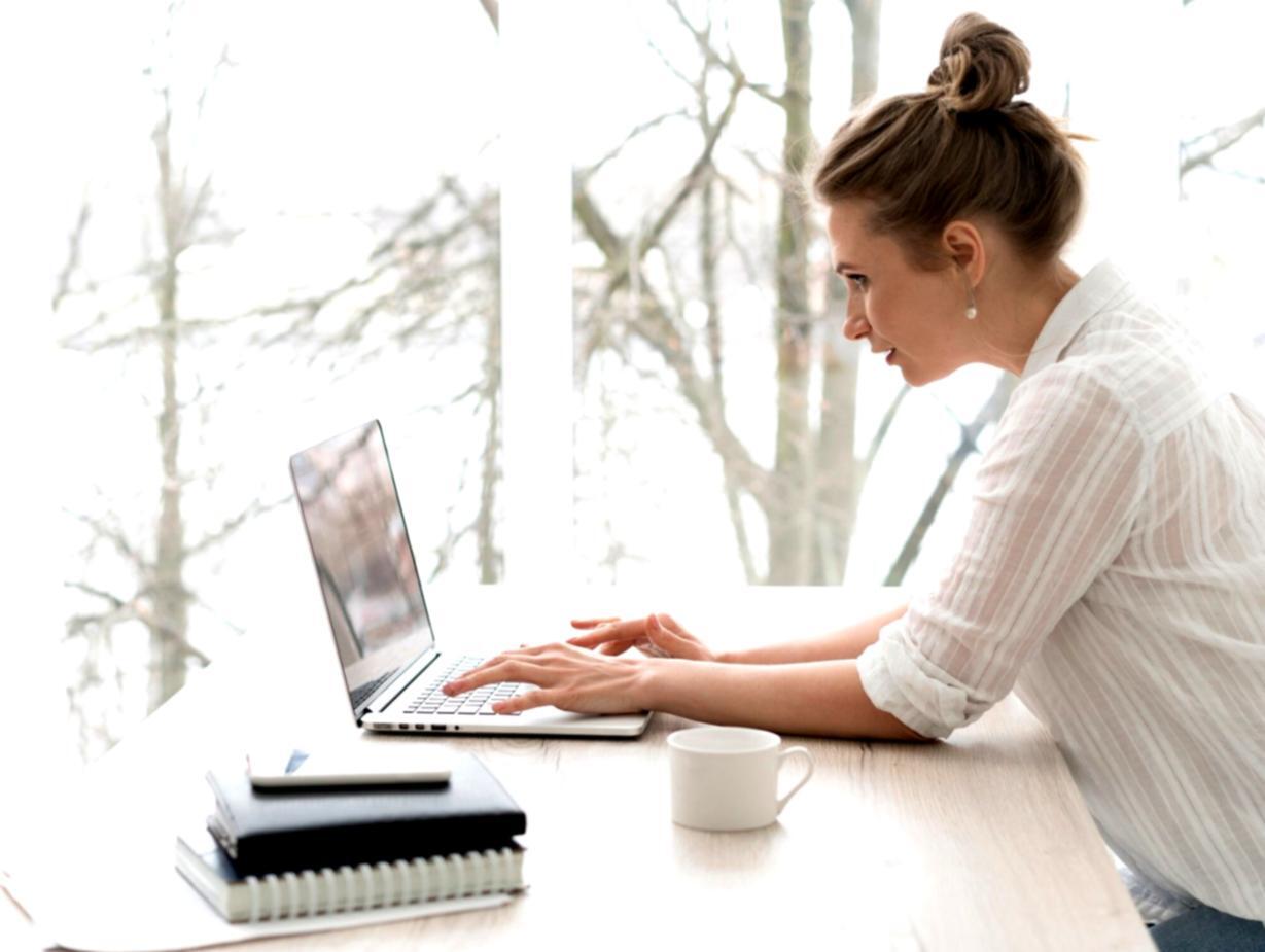 Financial analyst reviewing comprehensive business reports